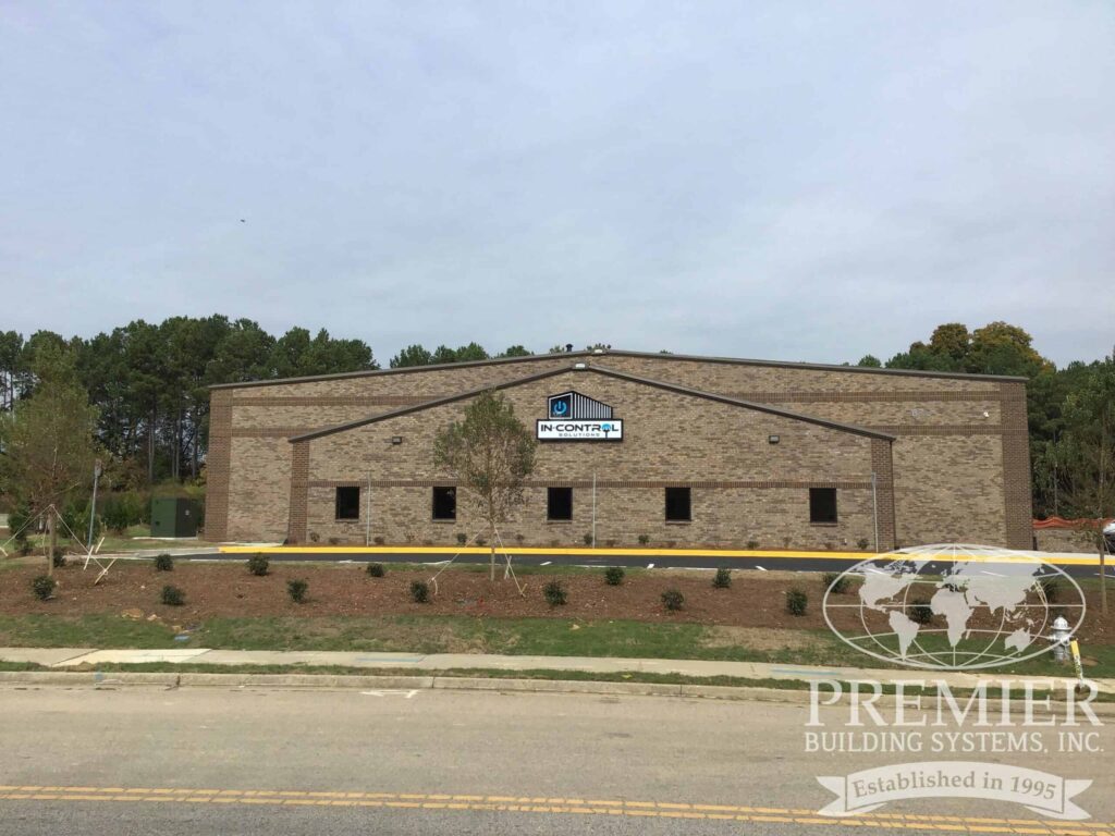 Metal building warehouse with brick facade